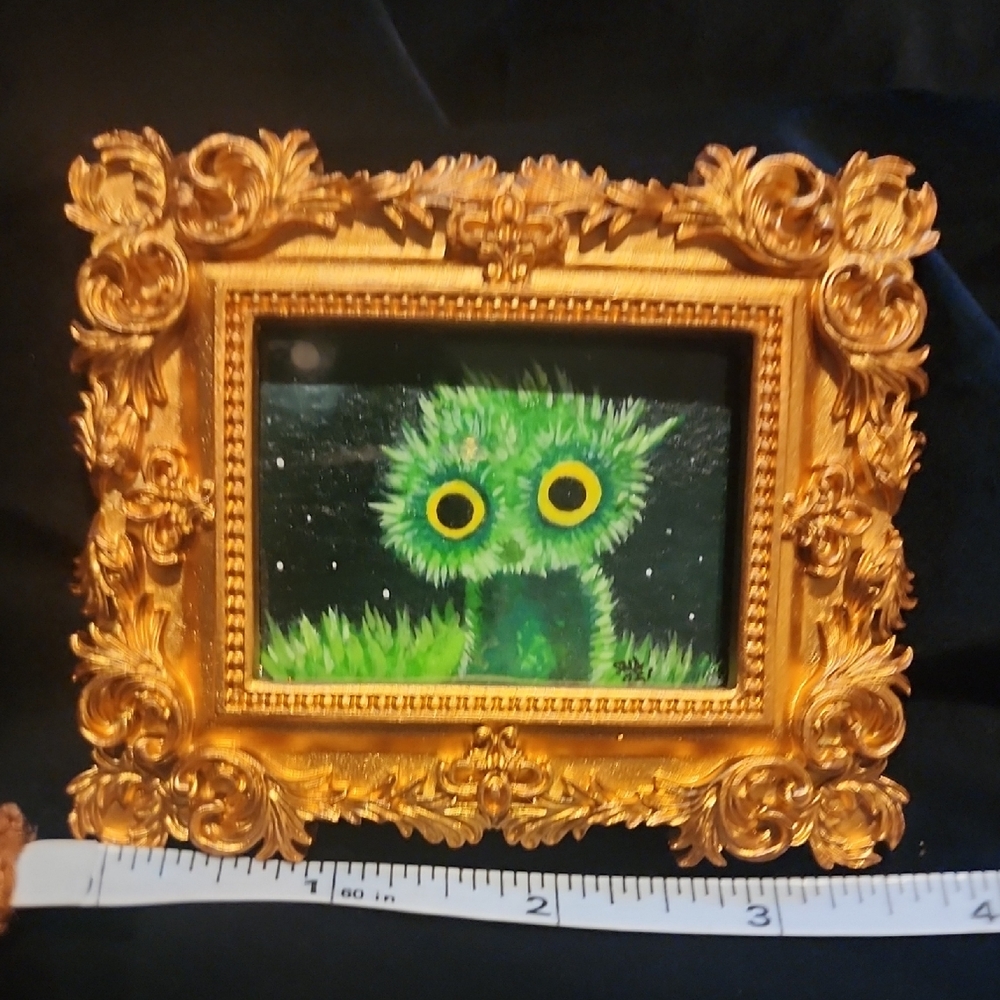 Gold Ornate Frame with Green Creature Art